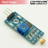 Authentic real-life image of Scienticy LM393 photosensitive LDR light sensor module for Arduino projects.