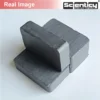 A real product photograph showing a stack of three 40x25x10mm rectangular black ceramic ferrite bar magnets arranged together under the Scienticy Real Image banner.