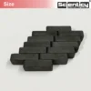 A real product photograph of multiple black rectangular ceramic ferrite block magnets stacked together in a bulk pack layout under the Scienticy Size banner.